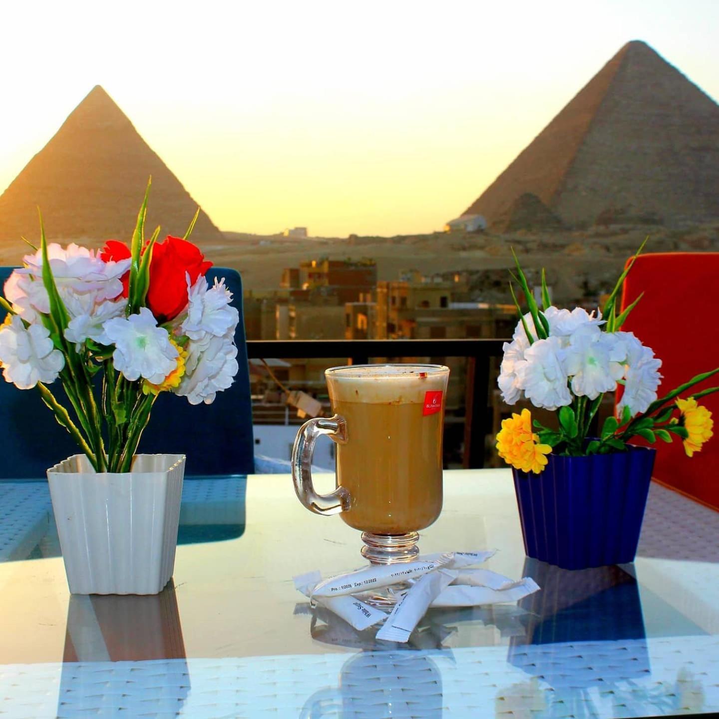 Sunrise Pyramids View Inn Kafrat al Jabal Bagian luar foto