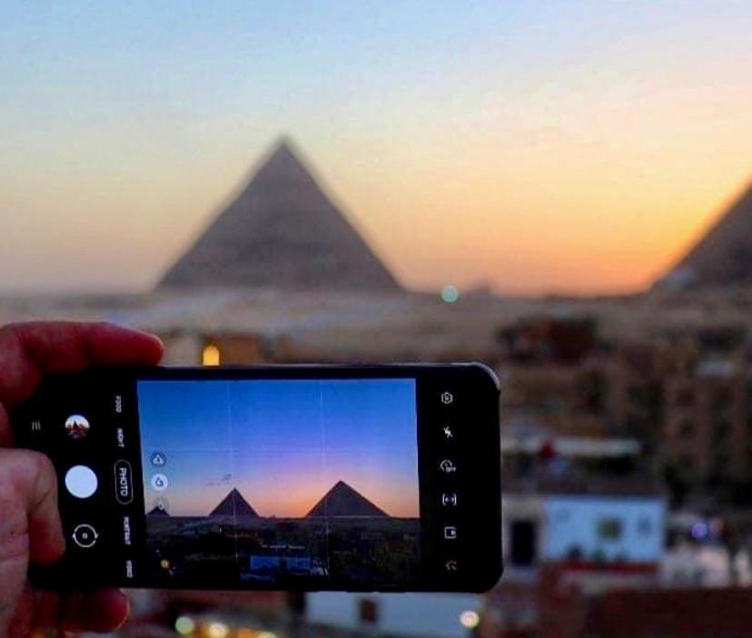 Sunrise Pyramids View Inn Kafrat al Jabal Bagian luar foto